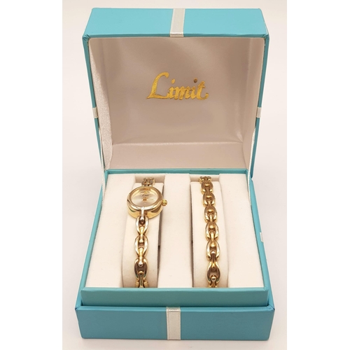 344 - A Limit Gold Plated Ladies Quartz Watch with Spare Bracelet. As new, unused in original case. In ful... 