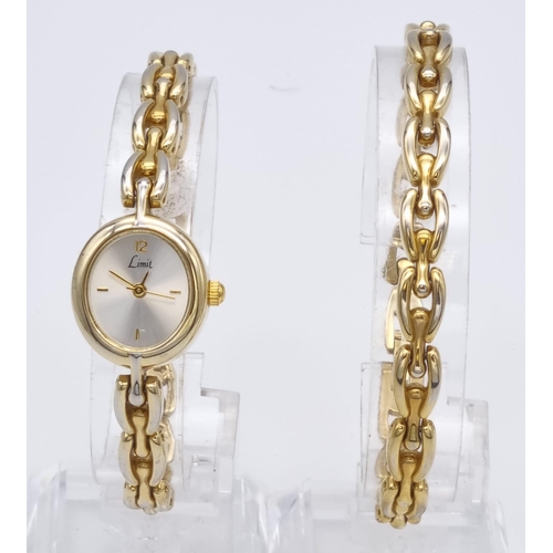 344 - A Limit Gold Plated Ladies Quartz Watch with Spare Bracelet. As new, unused in original case. In ful... 