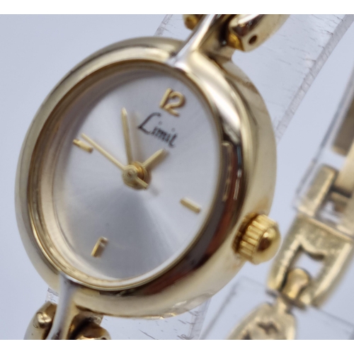 344 - A Limit Gold Plated Ladies Quartz Watch with Spare Bracelet. As new, unused in original case. In ful... 