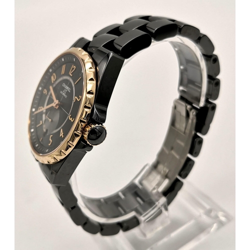 60 - A Chanel Black J12 Ceramic Ladies Watch. Black ceramic strap. Ceramic and rose gold case - 36mm. Bla... 