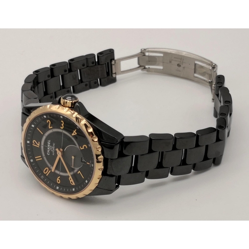 60 - A Chanel Black J12 Ceramic Ladies Watch. Black ceramic strap. Ceramic and rose gold case - 36mm. Bla... 