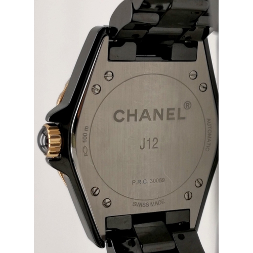 60 - A Chanel Black J12 Ceramic Ladies Watch. Black ceramic strap. Ceramic and rose gold case - 36mm. Bla... 