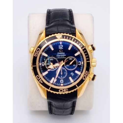 99 - An Omega Seamaster Planet Ocean 600M Co-Axial Chronograph 18K Gold Gents Watch. Black leather and ro... 