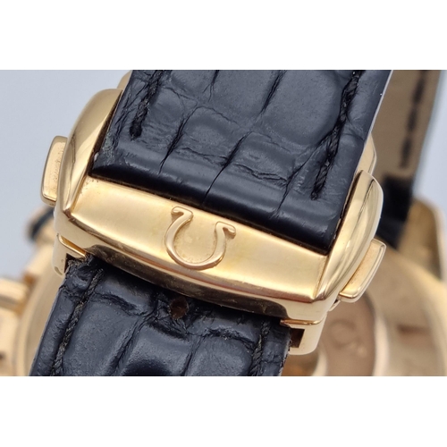 99 - An Omega Seamaster Planet Ocean 600M Co-Axial Chronograph 18K Gold Gents Watch. Black leather and ro... 