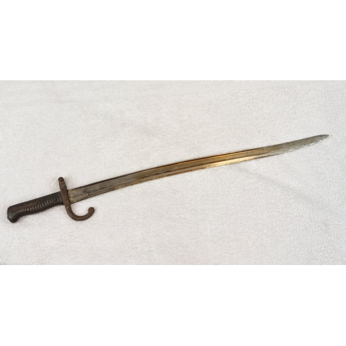 387 - An Antique 1870s Mauser Rifle Bayonet and Scabbard.
69cm total length.