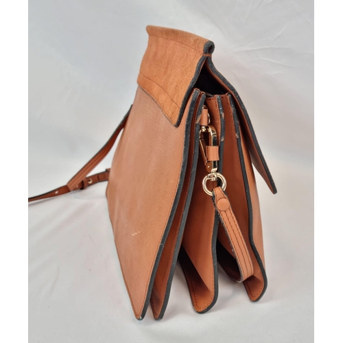 194 - A Chloe Brown Leather and Suede Shoulder Bag. Brown leather exterior with suede flap. Leather strap ... 