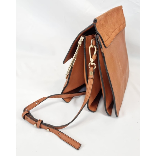 194 - A Chloe Brown Leather and Suede Shoulder Bag. Brown leather exterior with suede flap. Leather strap ... 