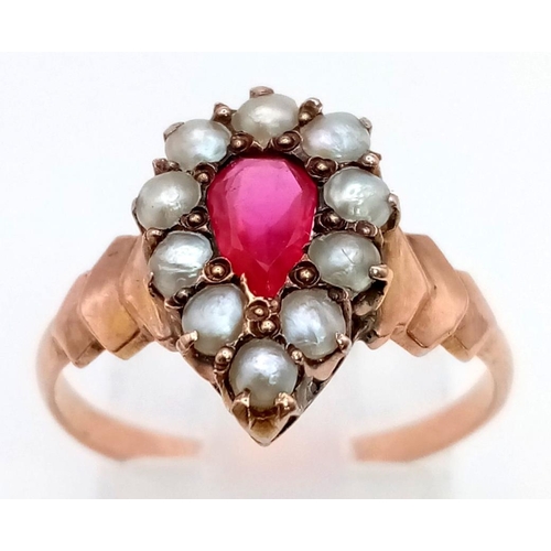 314 - A VINTAGE 14K ROSE GOLD SEED PEARL AND PINK RUBY PEAR SHAPED RING.  2.3gms  size P