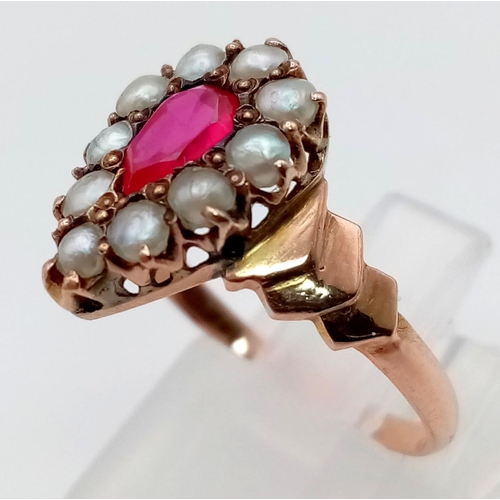 314 - A VINTAGE 14K ROSE GOLD SEED PEARL AND PINK RUBY PEAR SHAPED RING.  2.3gms  size P