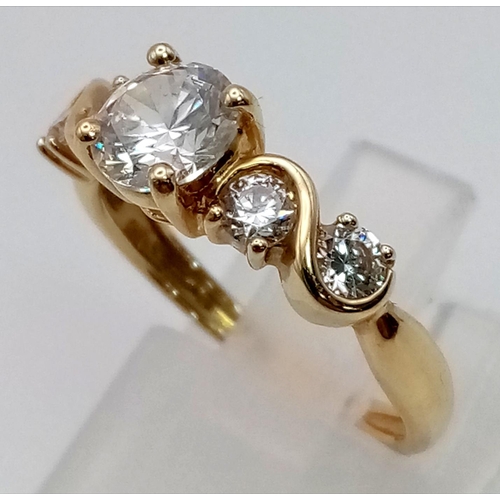 321 - A VERY IMPRESSIVE LOOKING 14K GOLD RING WITH CZ STONES.  2.8gms   size M/N