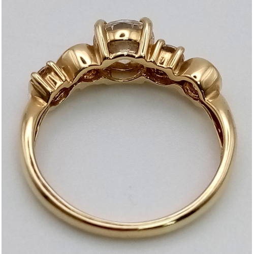 321 - A VERY IMPRESSIVE LOOKING 14K GOLD RING WITH CZ STONES.  2.8gms   size M/N