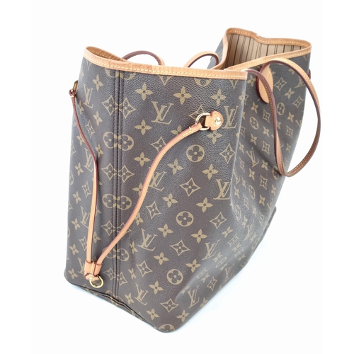 330 - A Louis Vuitton Articles de Voyage Tote Bag. Monogrammed canvas exterior with leather straps and gil... 