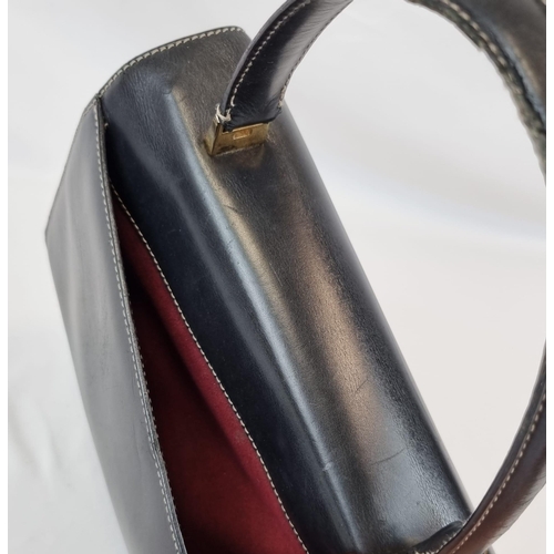 409 - An Italian Salvator Ferragamo Black Leather Bag. Red suede interior with zipped pocket. Optional sho... 