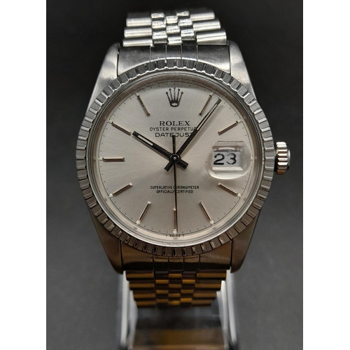 81 - A Rolex Oyster Perpetual Datejust Gents Watch. Stainless steel strap and case - 35mm. Silver tone di... 