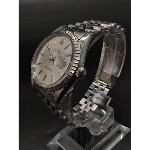 81 - A Rolex Oyster Perpetual Datejust Gents Watch. Stainless steel strap and case - 35mm. Silver tone di... 