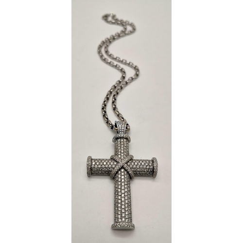 50 - A Theo Fennell 18K White Gold Diamond Cross Pendant on an 18K White Gold Chain. Hundreds of brillian... 