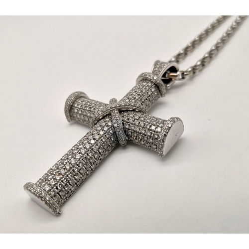 50 - A Theo Fennell 18K White Gold Diamond Cross Pendant on an 18K White Gold Chain. Hundreds of brillian... 