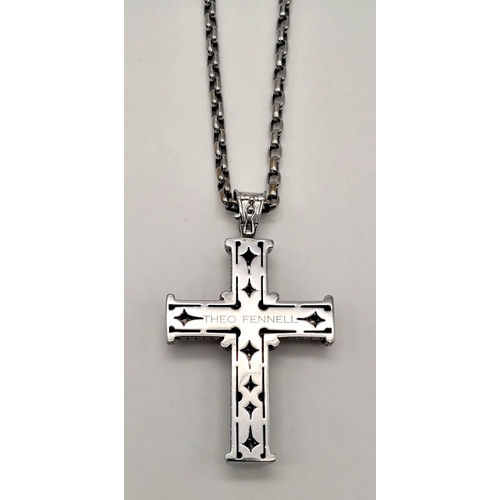 50 - A Theo Fennell 18K White Gold Diamond Cross Pendant on an 18K White Gold Chain. Hundreds of brillian... 