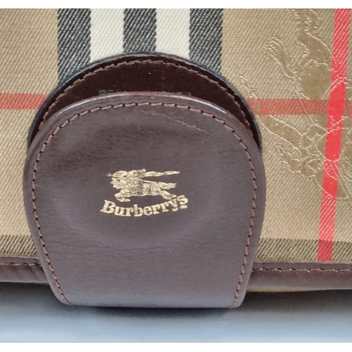 205 - A Classic Burberry London Haystack Check and Leather Crossbody Bag. Zipped interior compartment. In ... 