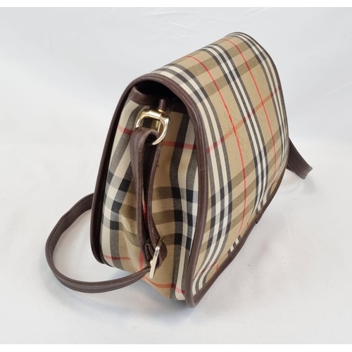 205 - A Classic Burberry London Haystack Check and Leather Crossbody Bag. Zipped interior compartment. In ... 