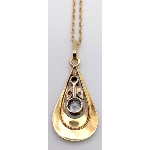 363 - A 4 DIAMOND PENDANT IN 14K GOLD ON A 14K GOLD 42cms CHAIN.  3.3gms