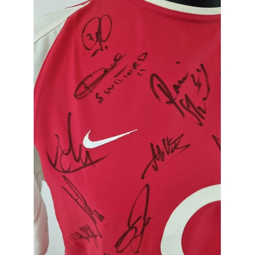 44 - A 2003/4 Arsenal FC Match Quality Signed Shirt. O2 sponsor era. Signatures to include: Adams, Henry,... 