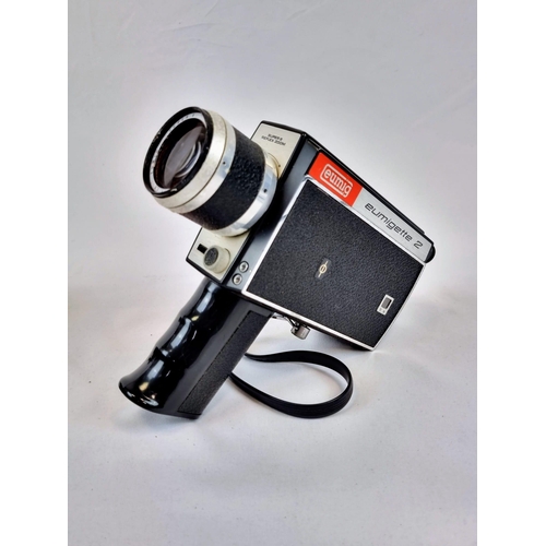 450 - A Brilliant Collection of Vintage Cameras. Including 35mm, instant, movie. Plus extra lenses and oth... 