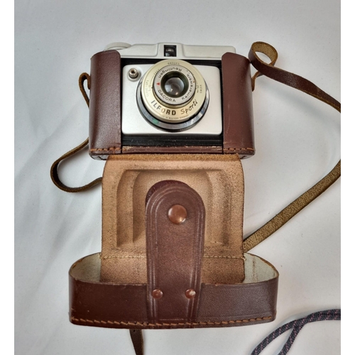 450 - A Brilliant Collection of Vintage Cameras. Including 35mm, instant, movie. Plus extra lenses and oth... 