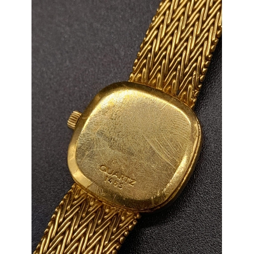 249 - An 18K Solid Gold Omega Ladies Dress watch. 18k bracelet and case - 16 x 16mm. Gold tone dial. Mecha... 