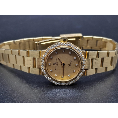 33 - A Baume and Mercier 18K Gold and Diamond Ladies Quartz Watch. 18k gold bracelet and case - 20mm. Dia... 