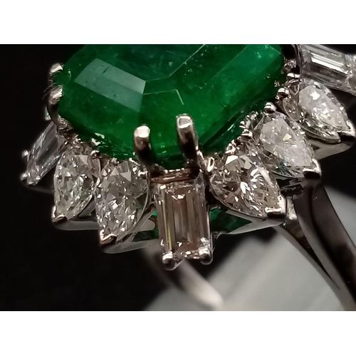 57 - A GIA Certified 18K White Gold Emerald and Diamond Ring. 4.35ct central octagonal-cut emerald surrou... 