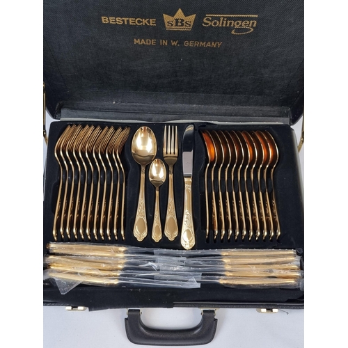 162 - A Brand New, Unused Solingen SBS 23/24K Gold Plated Cutlery Set. 72 items over two tiers in the orig... 