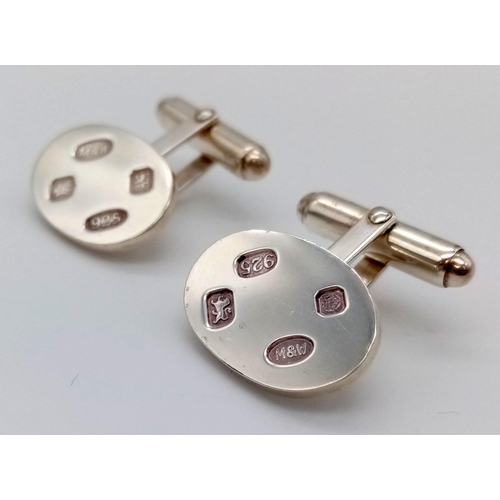 208 - A pair of Mappin and Webb sterling silver cufflinks in original box. 19mm in width, total weight 10.... 