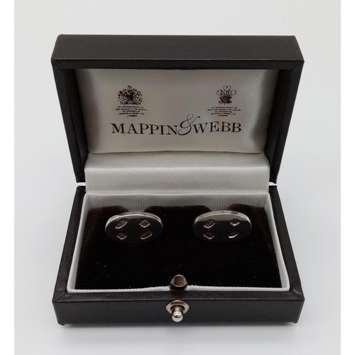 208 - A pair of Mappin and Webb sterling silver cufflinks in original box. 19mm in width, total weight 10.... 