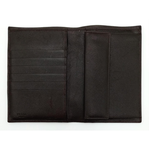 80 - A Gents Large Leather Prada Wallet with Authenticity Card. 16.5 x 11cm. In very good condition.