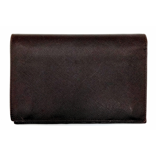 80 - A Gents Large Leather Prada Wallet with Authenticity Card. 16.5 x 11cm. In very good condition.