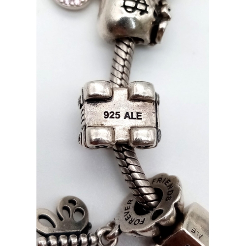 388 - A Pandora Silver Rope Charm Bracelet - 18 charms including: Heart, dolphin handbag, car, hedgehog, l... 