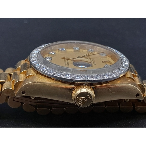 87 - An 18K Gold and Diamond Rolex Oyster Perpetual Datejust Ladies Watch. 18k gold strap and case - 26mm... 