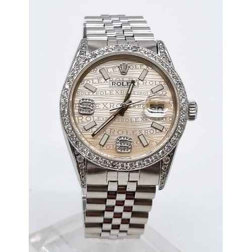 12 - A Rolex Stainless Steel and Diamond Datejust Watch. Stainless steel strap and case - 36mm. Diamond e... 