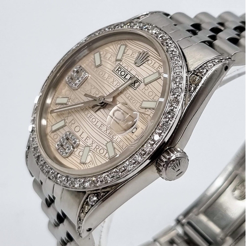 12 - A Rolex Stainless Steel and Diamond Datejust Watch. Stainless steel strap and case - 36mm. Diamond e... 