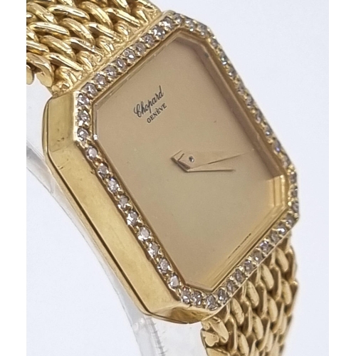 214 - A Chopard 18K Gold and Diamond Ladies Watch. 18K gold strap and case - 20mm. Diamond bezel. Gold dia... 