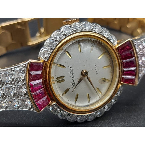 258 - A Cortebert 18k Gold Diamond and Ruby Ladies Watch. 18K gold, diamond and ruby bracelet. 18K gold an... 