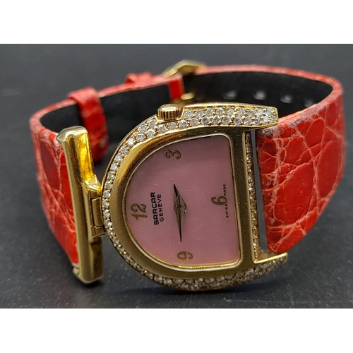 283 - A Sarcar Geneve 18K Gold and Diamond Ladies Watch. Original leather strap with 18k gold hardware. 18... 