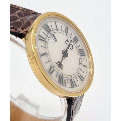 472 - An 18K Gold Hour Window and Elaborate Minute Pointer Watch. Leather and 18k gold strap. 18k gold cas... 