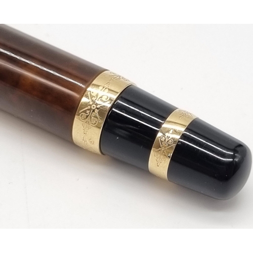 89 - A Mont Blanc Limited Edition Francois Fountain Pen. Black resin and gold plate cap. Brown resin and ... 