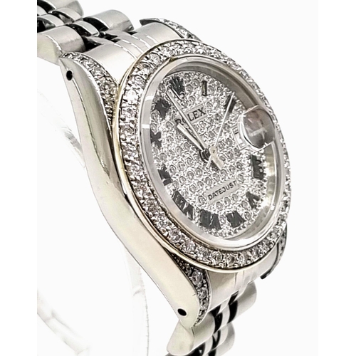 93 - A Rolex Diamond Encrusted Datejust Automatic Ladies Watch. Stainless steel strap. Diamond encrusted ... 