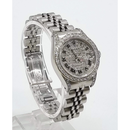 93 - A Rolex Diamond Encrusted Datejust Automatic Ladies Watch. Stainless steel strap. Diamond encrusted ... 