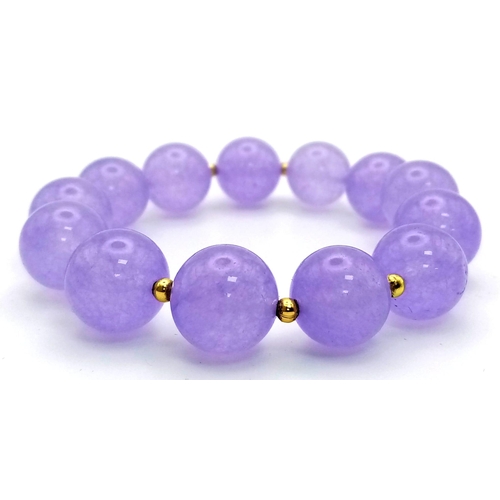 1176 - A Lavender Jade Beaded Expandable Bracelet. Gilded spacers.