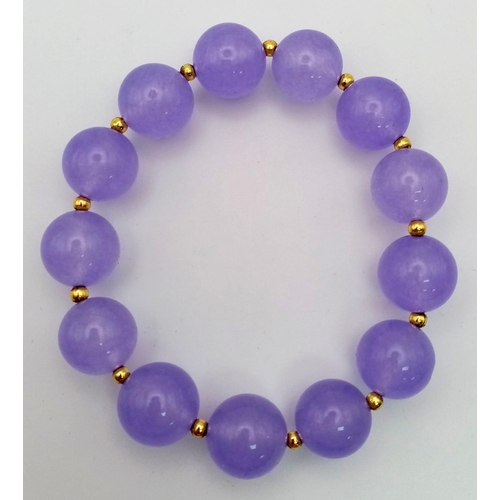 1176 - A Lavender Jade Beaded Expandable Bracelet. Gilded spacers.