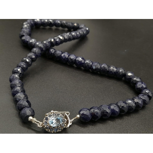 166 - 510ct Faceted 9mm-10mm Blue Sapphire Necklace with Blue topaz and Sapphire clasp set in 925 silver. ... 